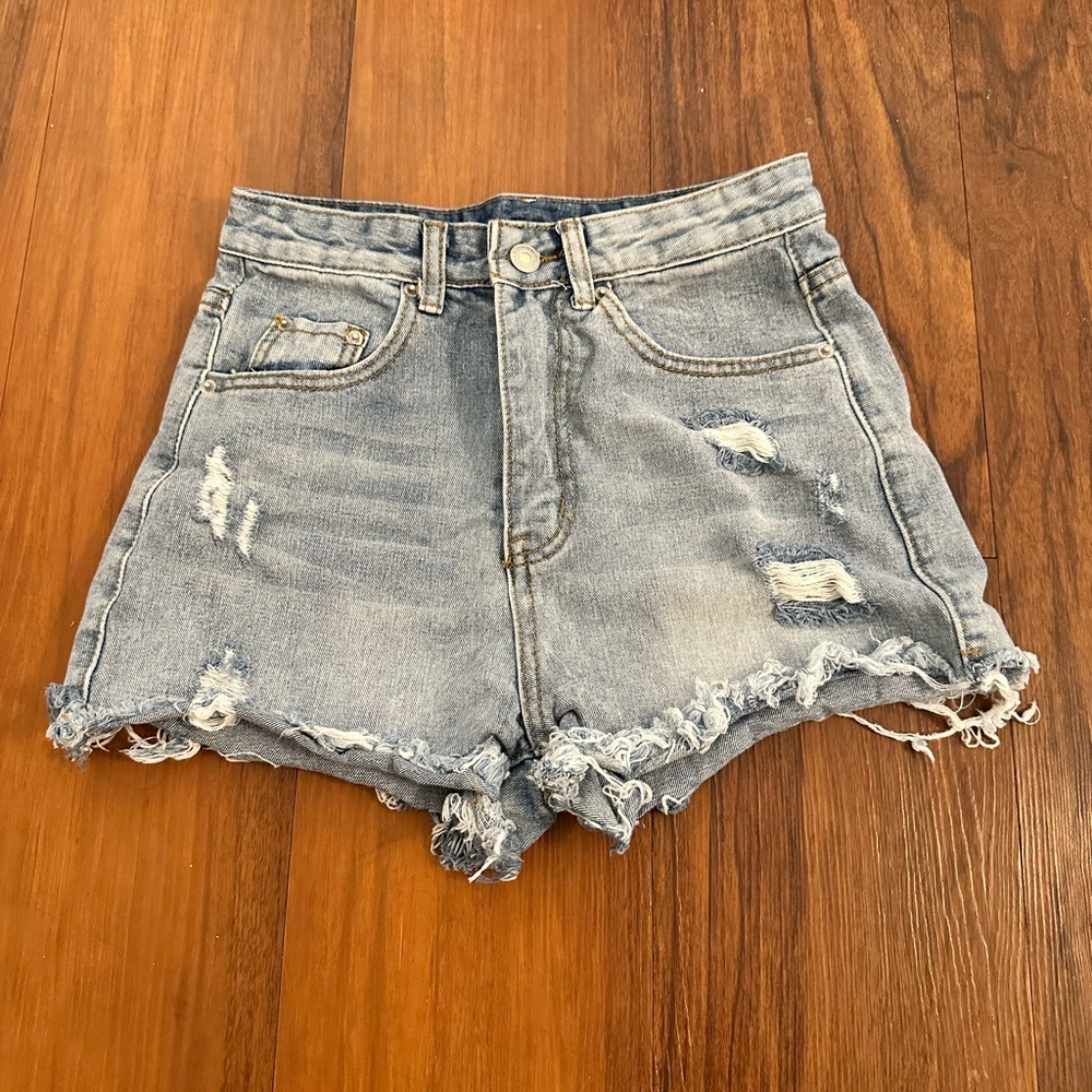 Distressed denim shorts